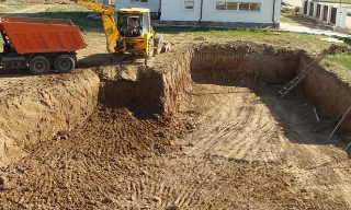 Рытье котлованов под фундамент в Киселевске – цена от 2576 руб. за м3 | 2Землекопа-Ксл